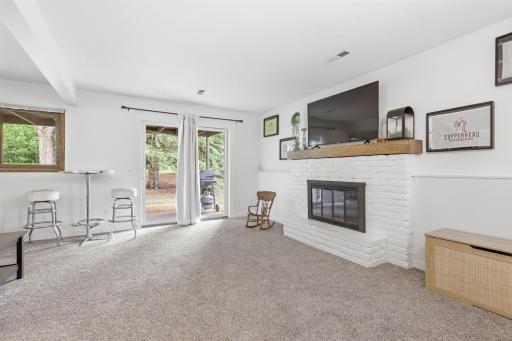 Cozy family room with wood burning fireplace