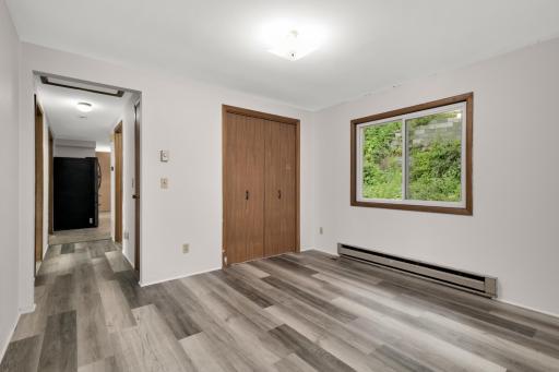 The office could be made into a fourth bedroom with the addition of a wall or converted to a kitchenette creating a 1 bed, 1 bath lock off rental with large family room and private garage stall for passive income.