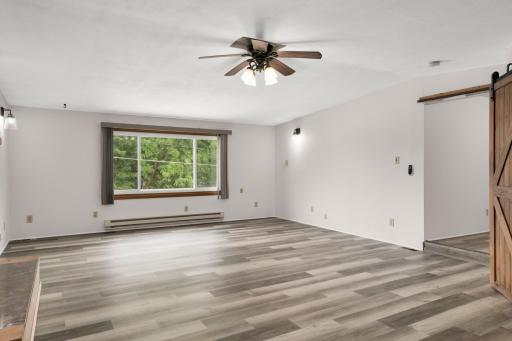 Picture window adds so much light to this amazing gathering space.