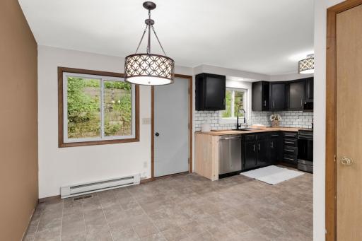 Spacious dining area with great flow to both the kitchen and living room.