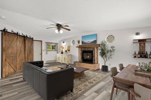 Huge family room addition has vaulted ceiling, cozy gas fireplace and direct access to the second backyard deck.