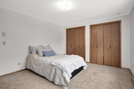 Second main level bedroom is large and has double closets.