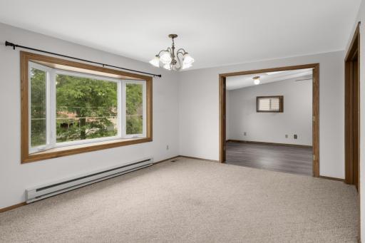 Dramatic french door entrance to the primary bedroom off of the living room.