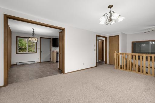 Easy flow to the kitchen and dining area for daily living or entertaining.