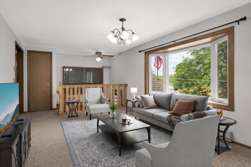 Living room virtually staged to show potential.