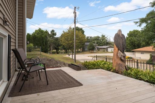 Enjoy the sunshine on this front maintenance free deck/patio