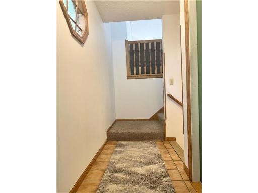 Beautiful entrance foyer with quality tile flooring and inviting first impression