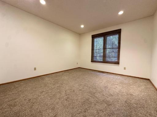 Bedroom #2 on the upper level features recessed lighting