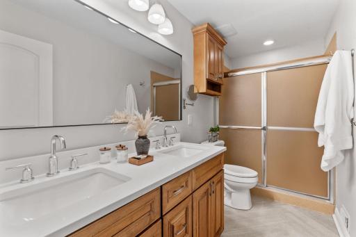 Main Level Primary Suite w/ updated en-suite bath + dual organized closets