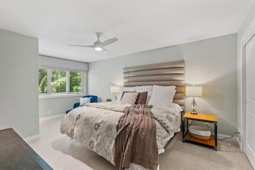 Main Level Primary Suite w/ updated en-suite bath + dual organized closets