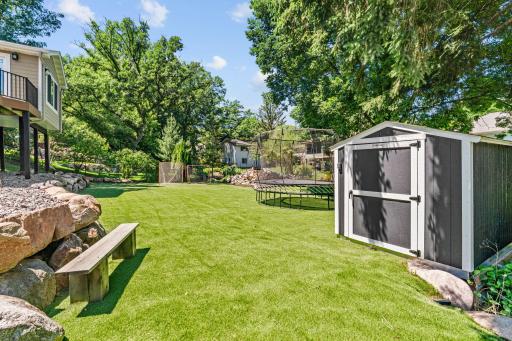 Upgraded maintenance-free turf in backyard