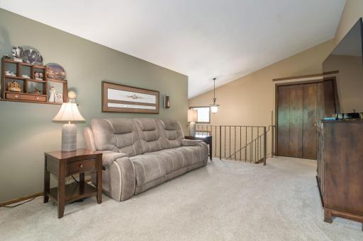 Living Room facing stairs to entry