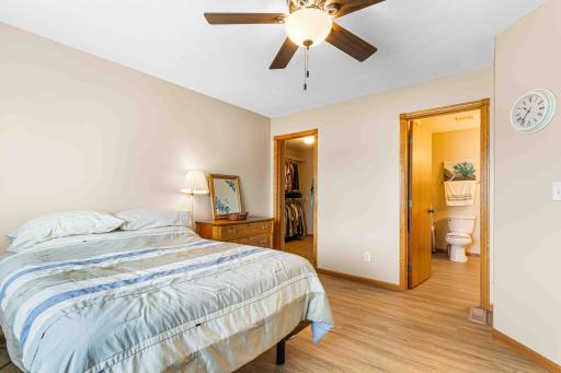 Primary bedroom with Hollywood bath and huge walk-in closet