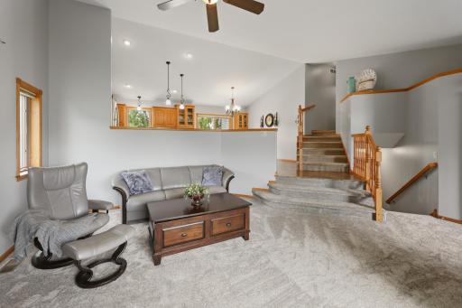A pony wall separates the kitchen & dining space from the living room allowing for structured areas within the open concept design.