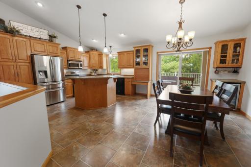 Large, impressive kitchen with SS appliances, a center island and ample storage.