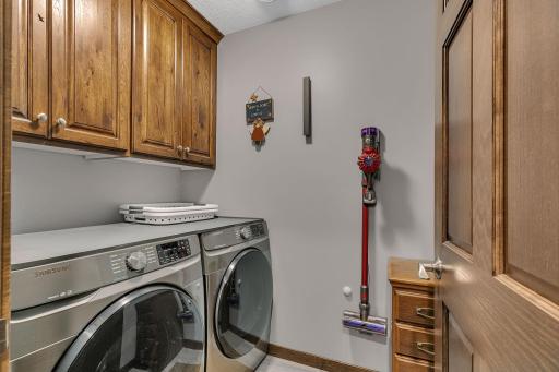 Designated Laundry room boasts additional storage.
