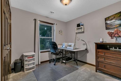 3rd bedroom is currently utilized as a craft/sewing room.