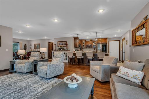 Hickory flooring compliments the kitchen back drop.