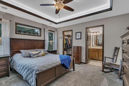 Primary Owners suite with view of bathroom and walk in closet.