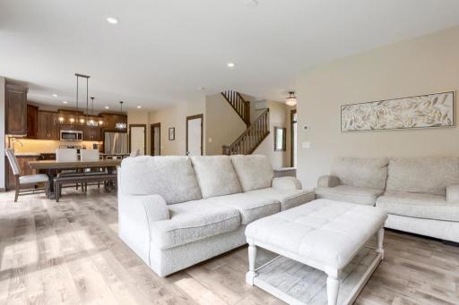 Very open concept with LVT flooring in the living room, dining room and kitchen. Electric fireplace in the living room. Builtin speakers in the living room (not currently hooked up.)