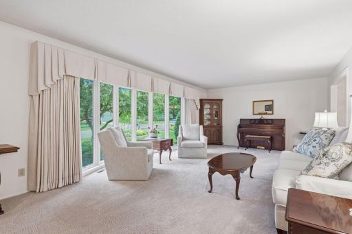 Floor to ceiling windows soak in the natural light