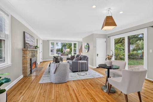Gleaming original hardwood floors flow throughout the house