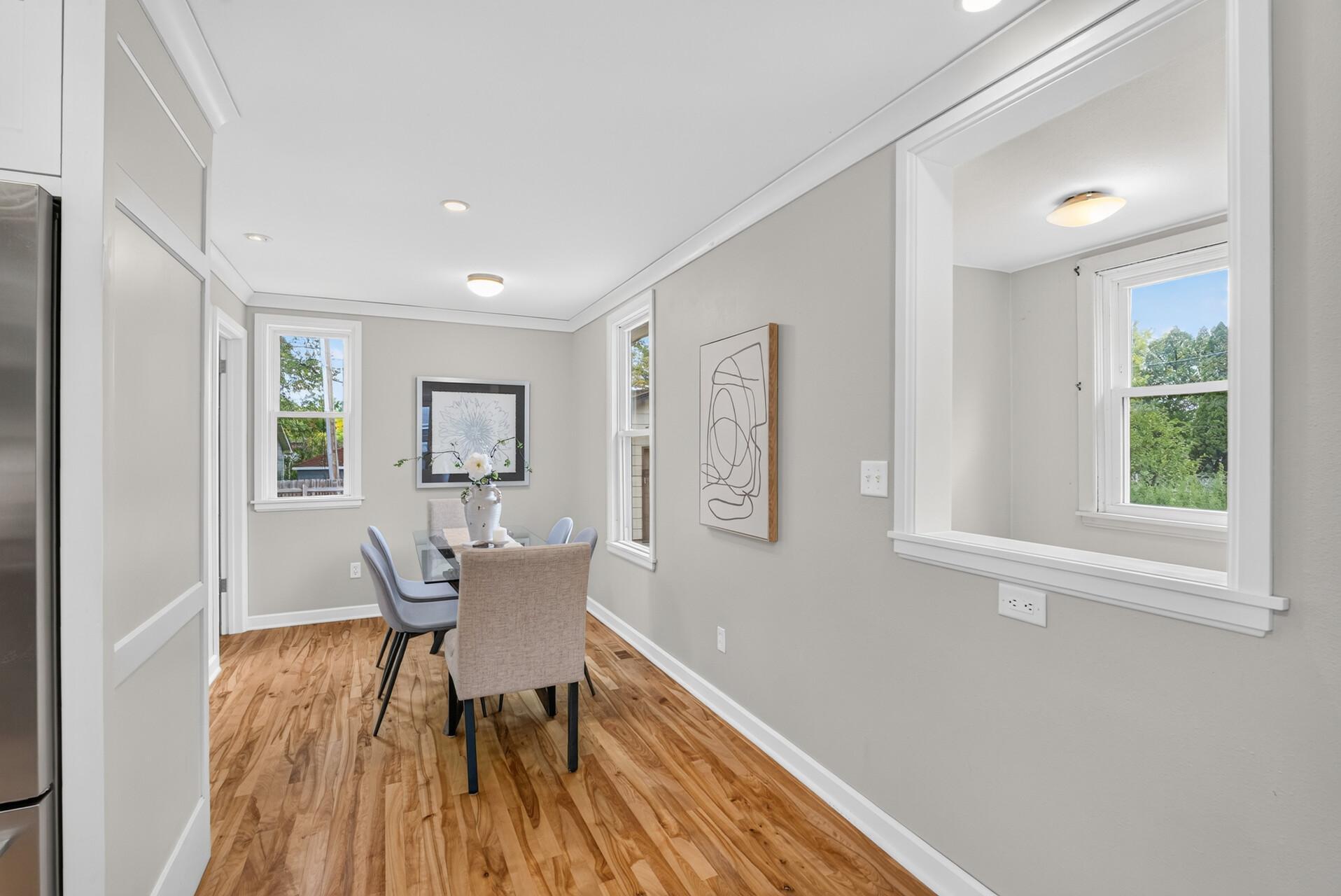 A 'window' over the basement stairway brings in natural light