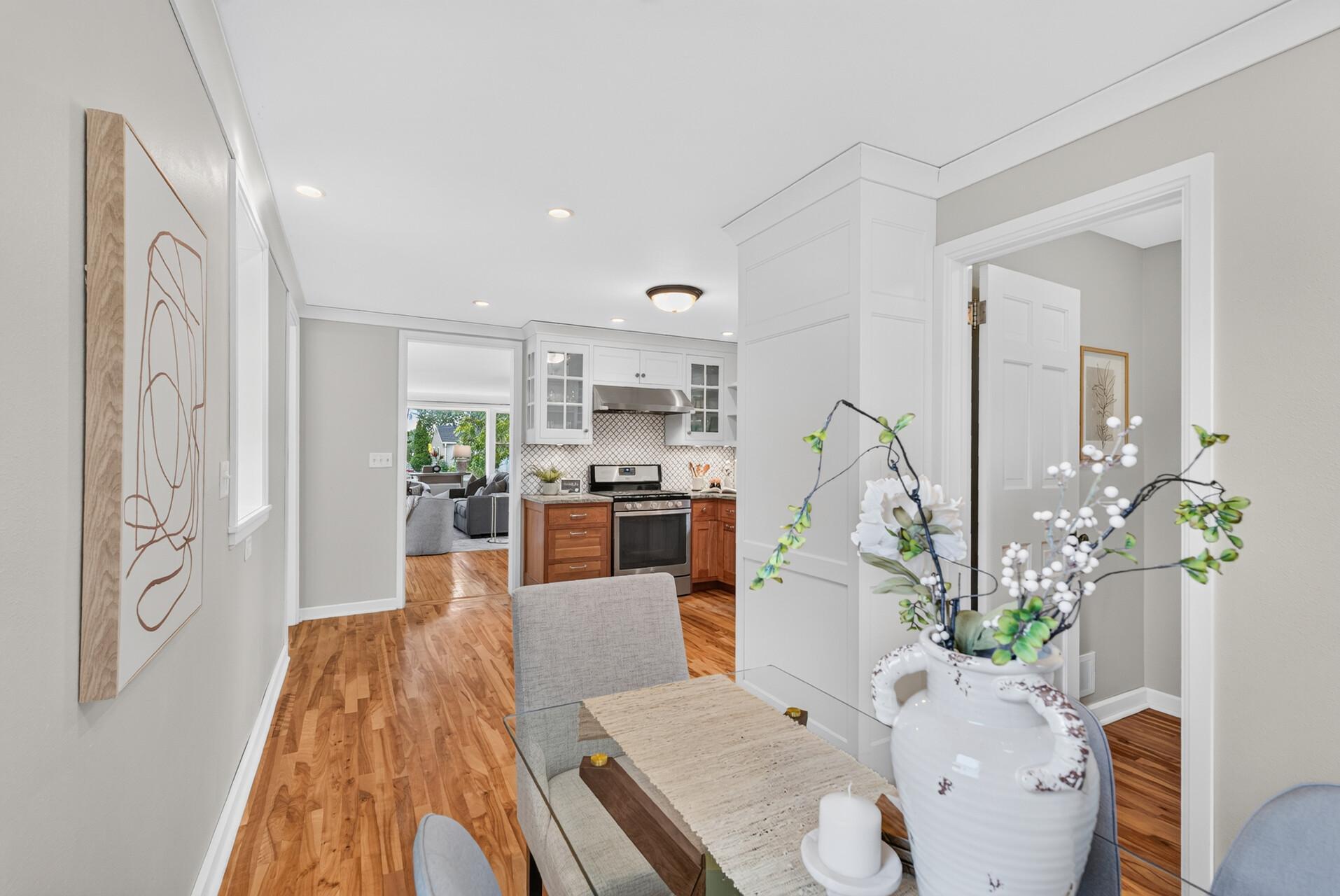 Hardwood floors and crown molding in this renovated section of the house were carefully made to flow into the rest of the house