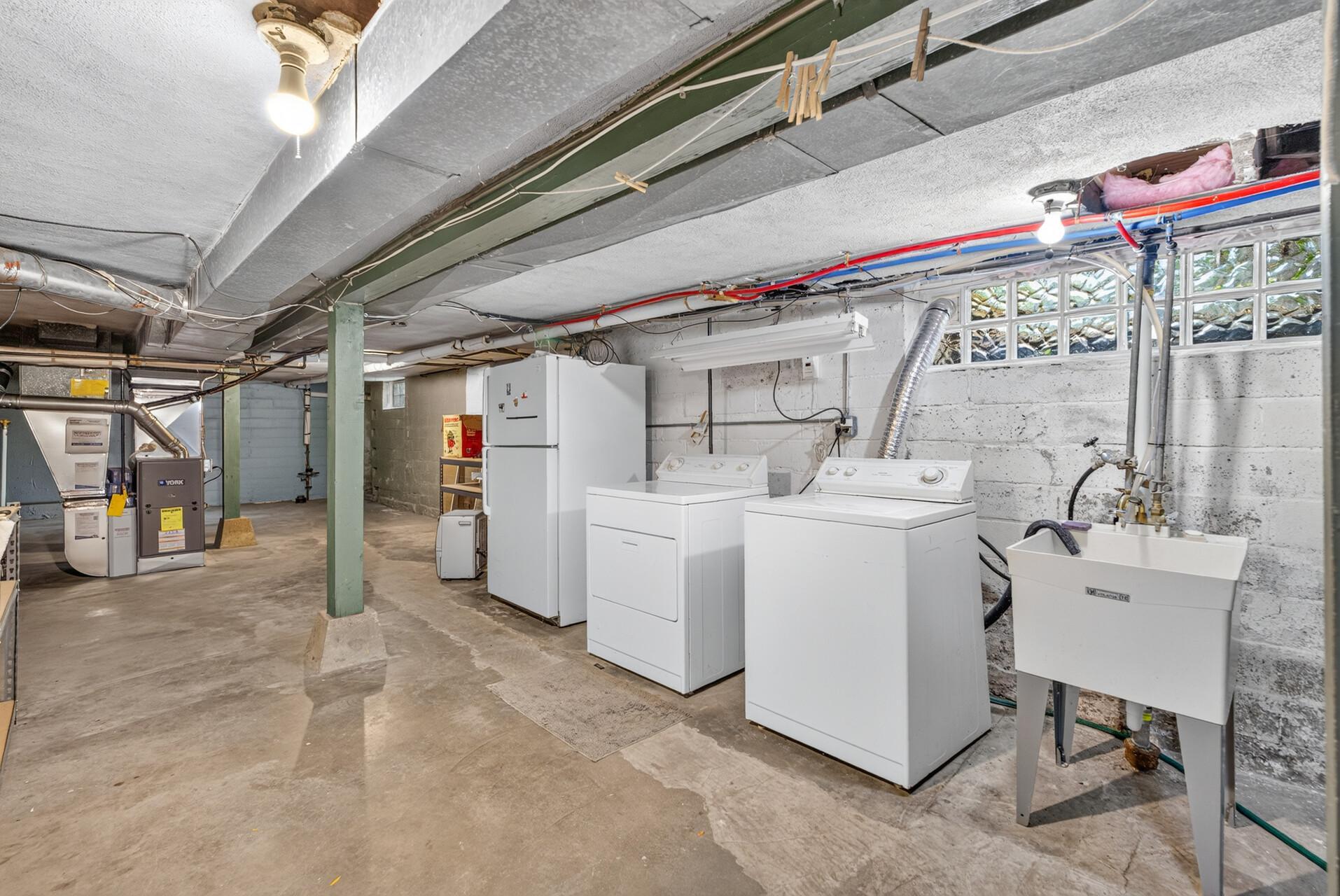 The laundry is in the unfinished basement