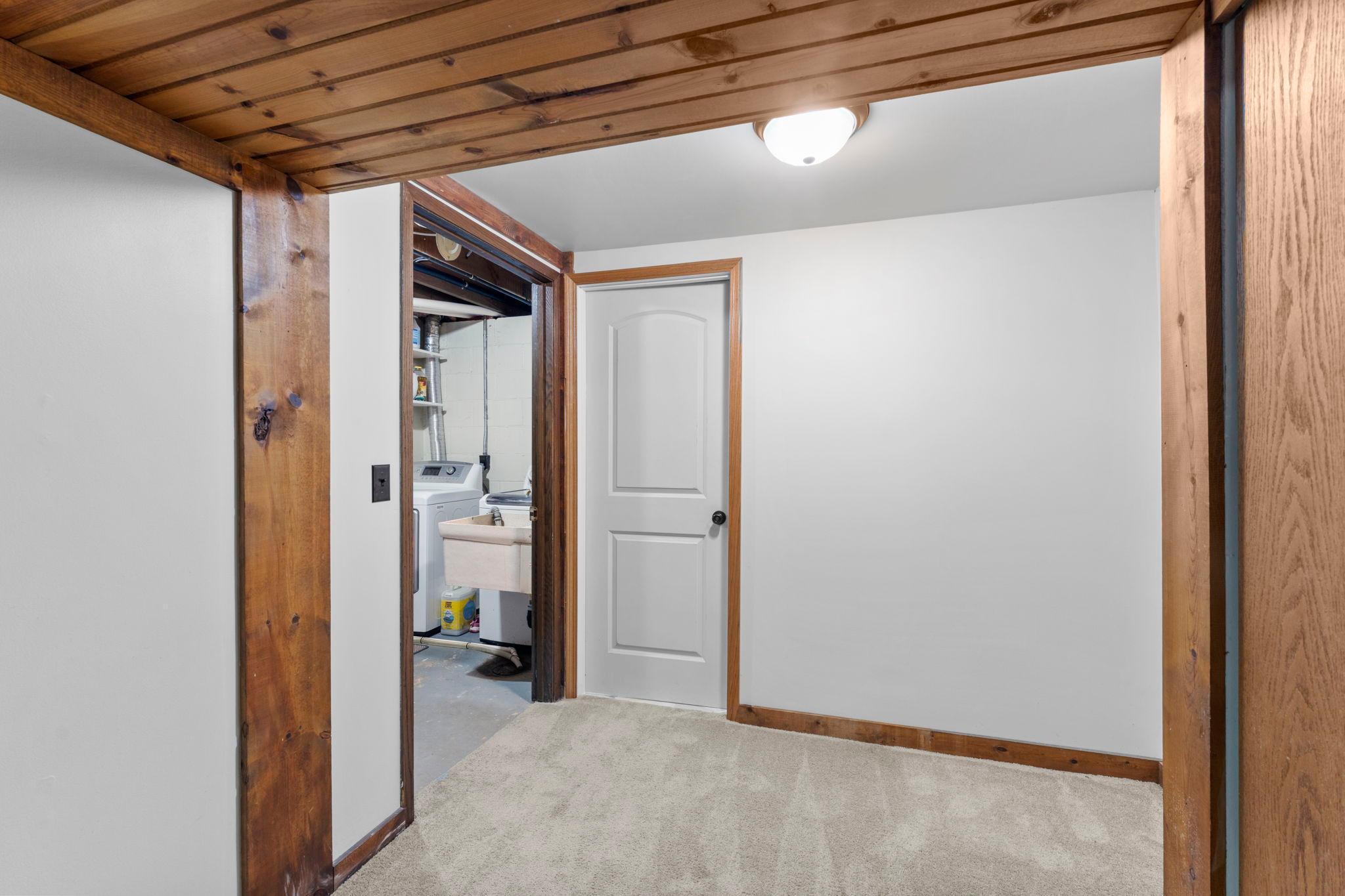 Lower level laundry/ mechanicals and bathroom 2