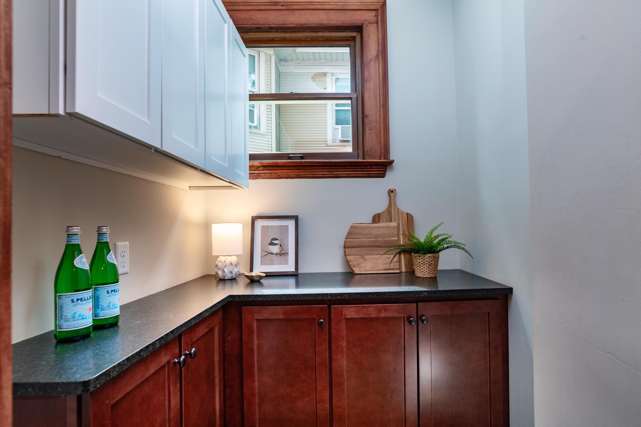 There is plenty of storage in the full pantry right off of the kitchen.