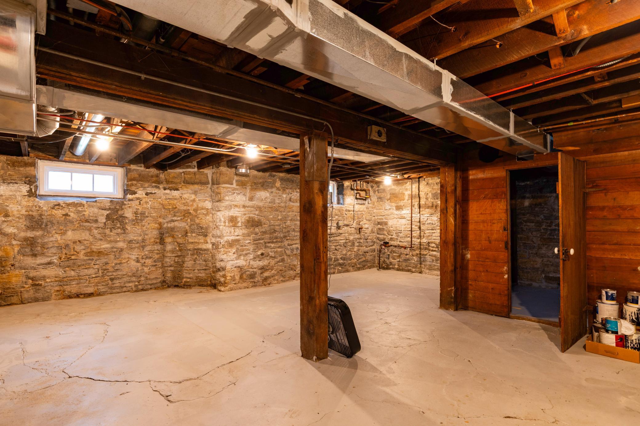 The unfinished basement could be utilized
