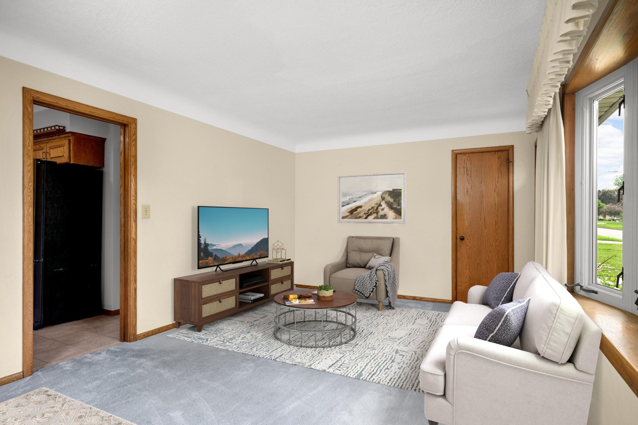 Front entry and living / dining room.