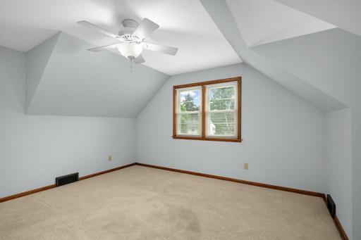 Large 3rd bedroom is upstairs and has a high ceiling.
