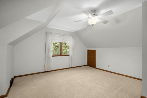 Large 4th bedroom is also upstairs with high ceiling.