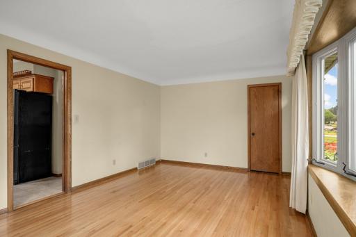 Living room with just-refinished original hardwood floor.