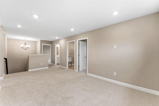 The upper landing offers ease of access to upper level living spaces