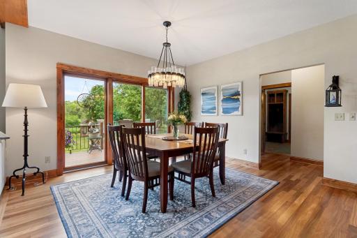 Dining area with a maintenance free deck off of it