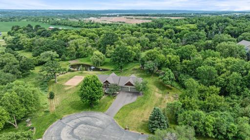 Sand volleyball and a spring fed pond with a fountain