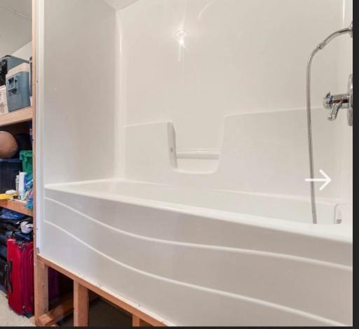 This home even has a dog wash in the lower level