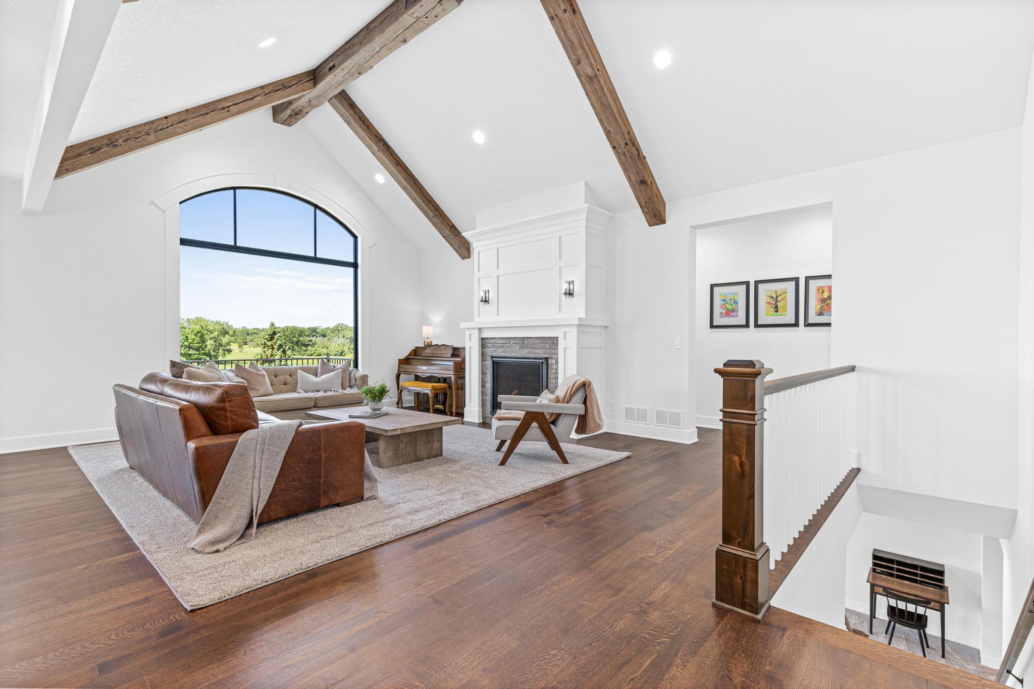 Designed for gathering and entertaining, the expansive main living area seamlessly connects indoor comfort with outdoor beauty.