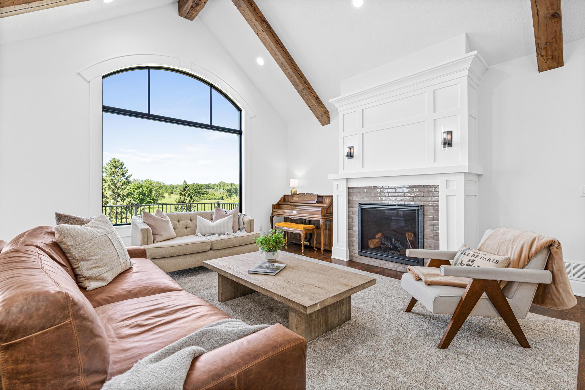 Every detail was thoughtfully curated to bring the outdoors in and celebrate the home's incredible setting. Cozy and inviting, the fireplace completes and room and provides great ambiance.