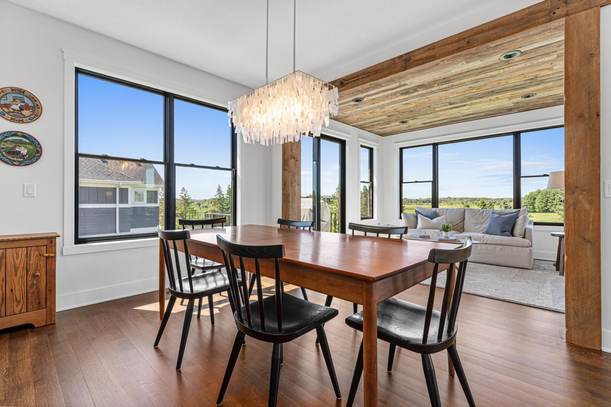 Enjoy everyday meals or host unforgettable dinner parties in this inviting dining space surrounded by natural light.