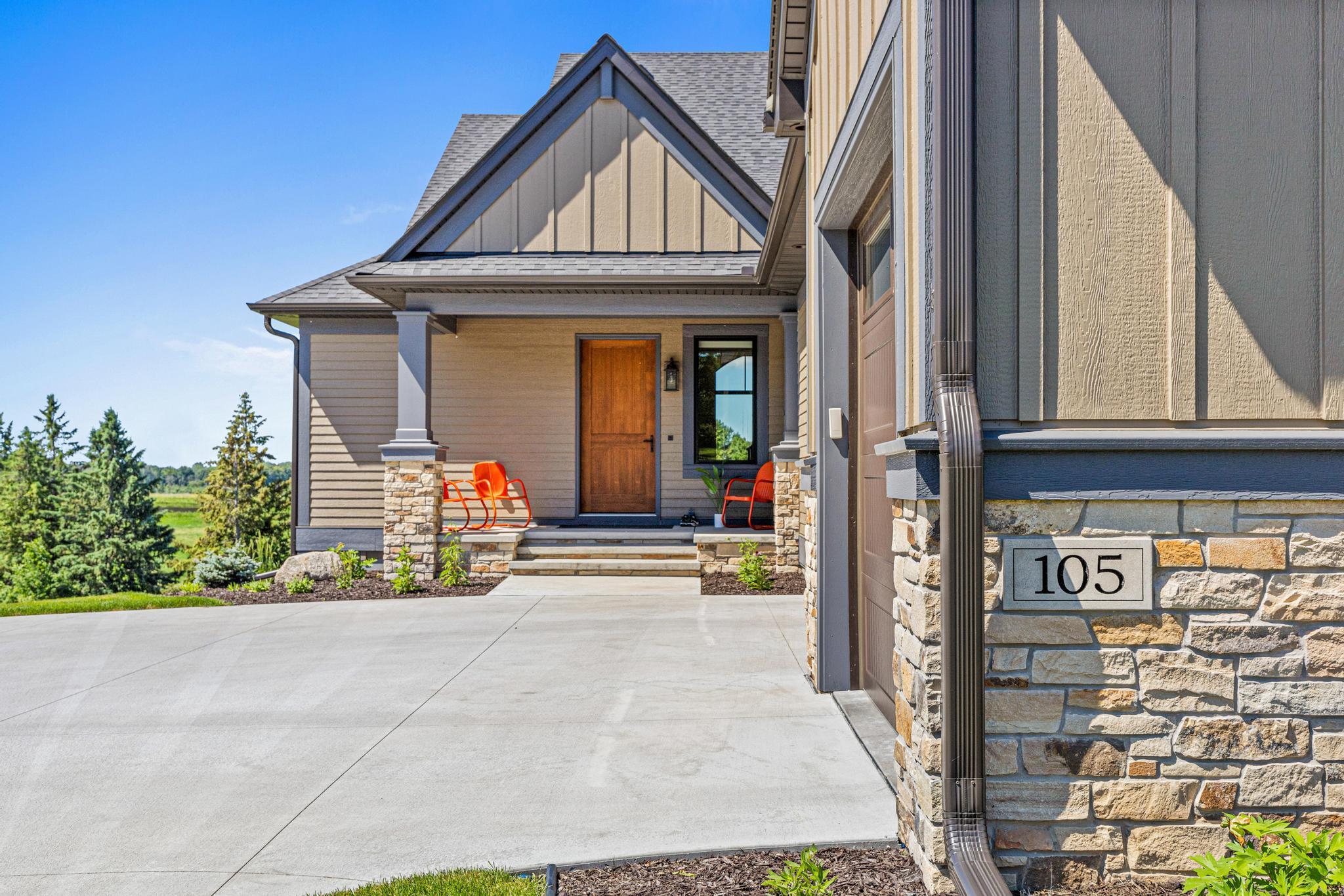 Charming front porch welcomes friends and visitors. A great place to enjoy your morning coffee or chat with neighbors.