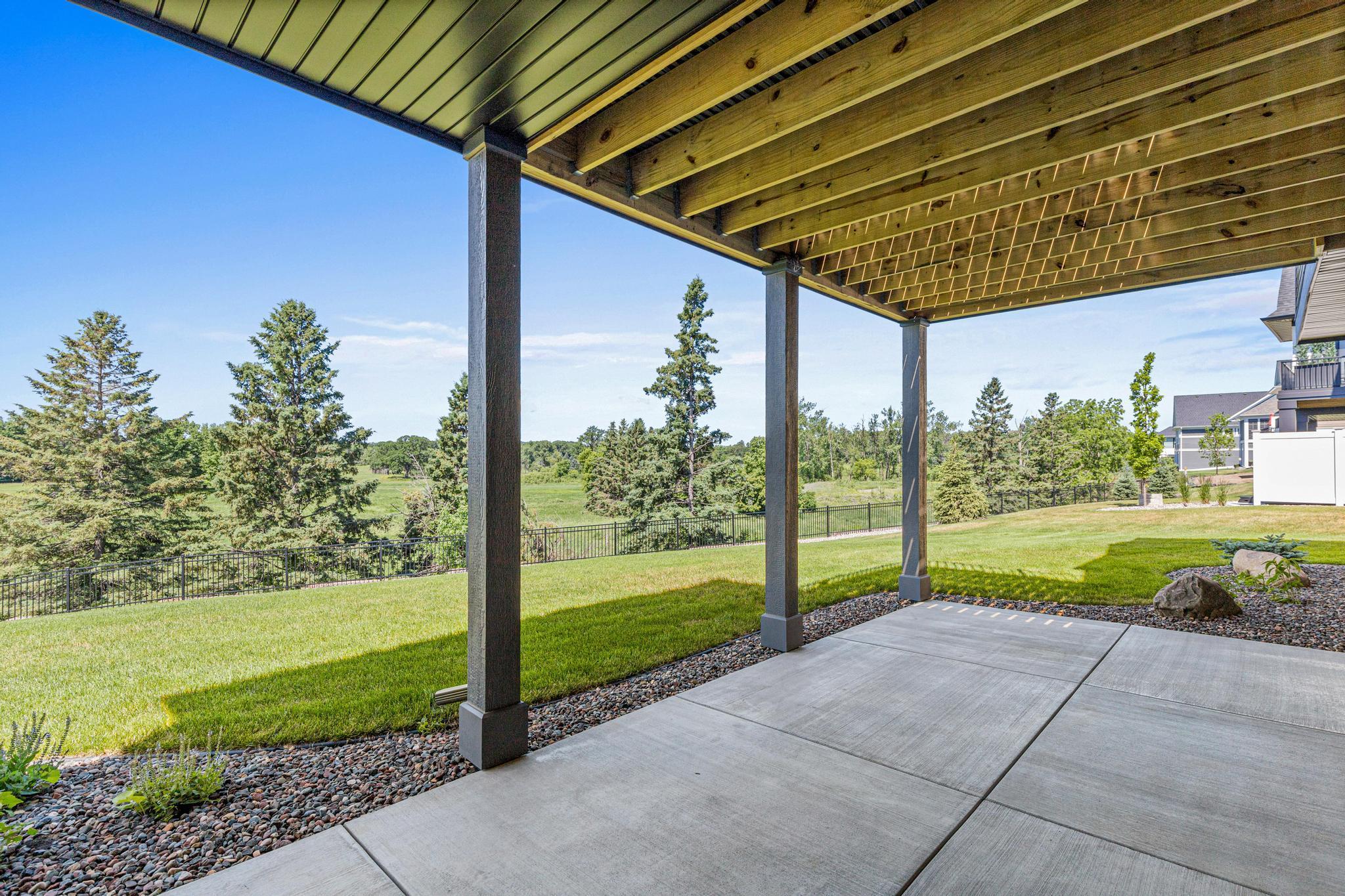 The expansive walkout patio creates a seamless transition between indoor and outdoor living.