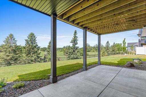 The expansive walkout patio creates a seamless transition between indoor and outdoor living.