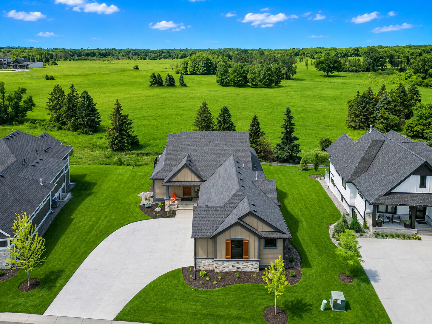 Nestled among rolling green spaces, mature trees, and protected natural surroundings, this home offers a rare blend of luxury and tranquility. AI enhanced.
