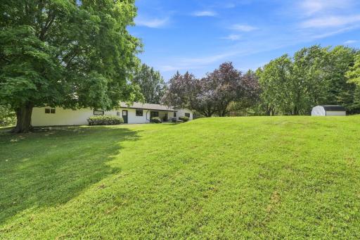 Backyard shows 12x8 shed with concrete pad!.jpg