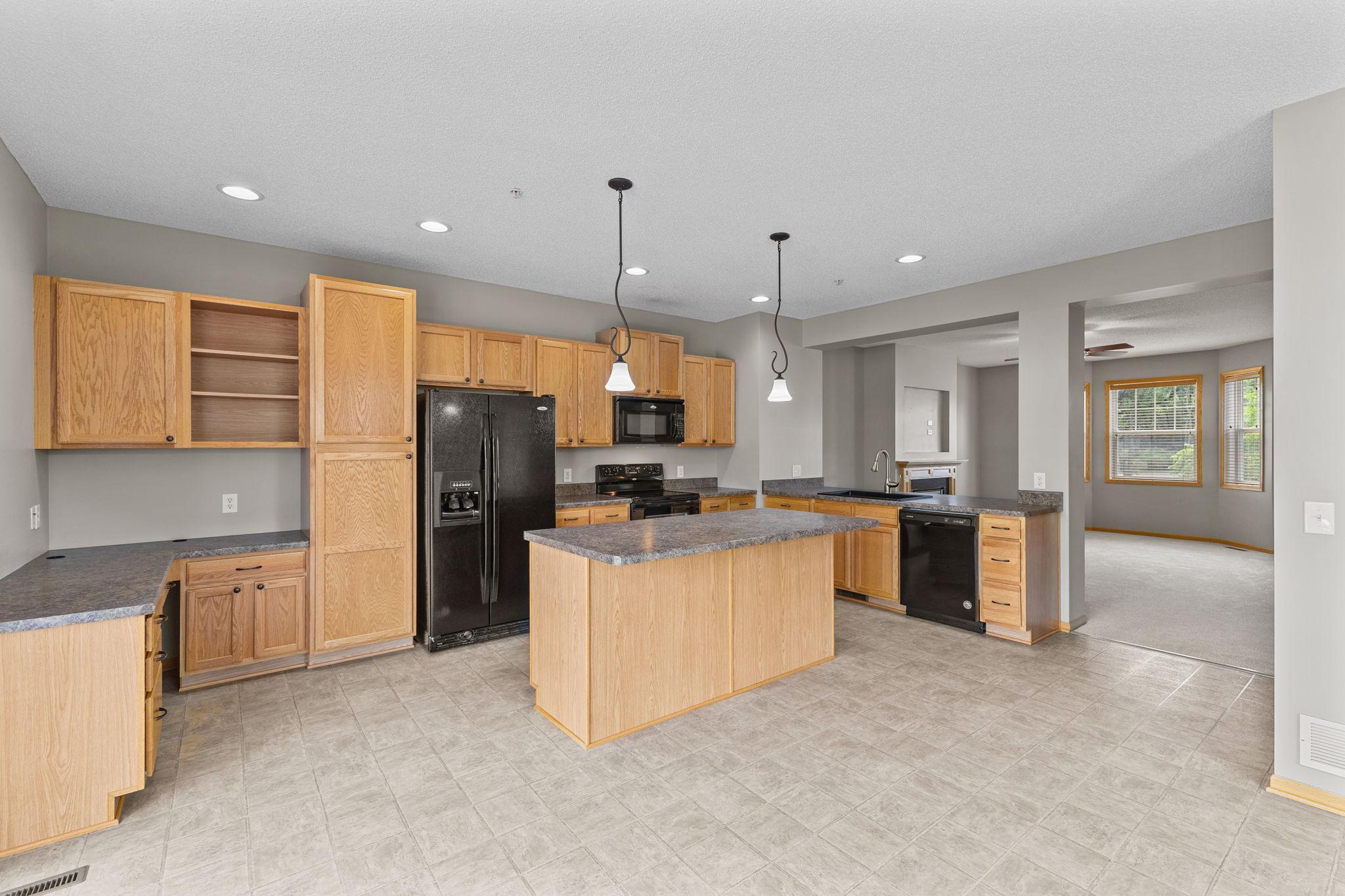 This spacious kitchen has all the space you need for gatherings or alone time.