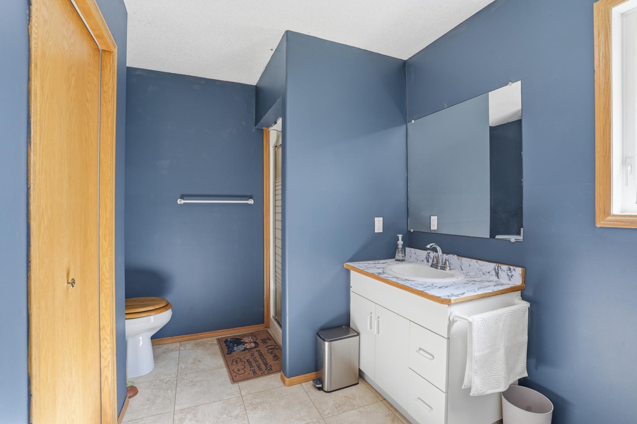 Additional bath within laundry room